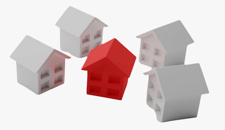 Figuras con forma de casas de plástico color blanco y rojo